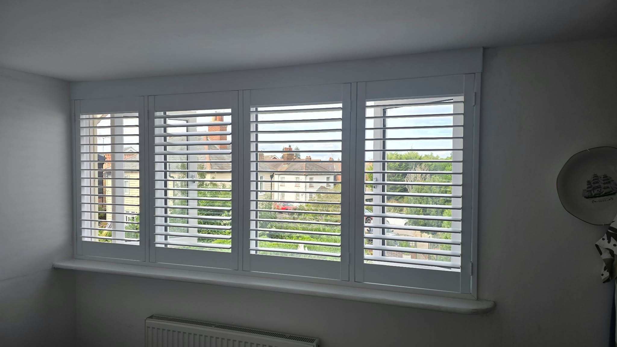 Shutters on a residential street — Sustainable Shutters & Blinds
