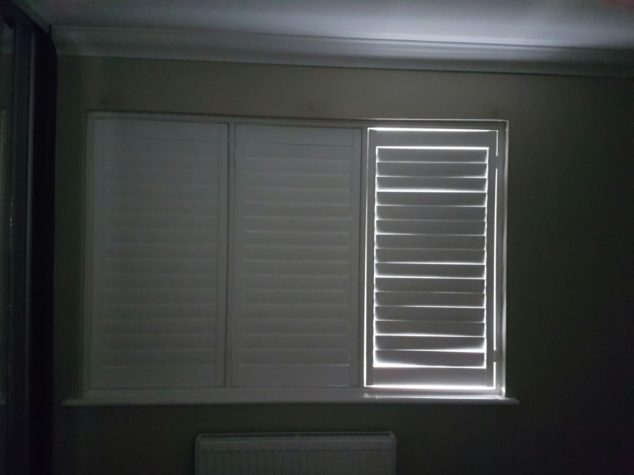 Shutters with louvres open showing light — Sustainable Shutters & Blinds