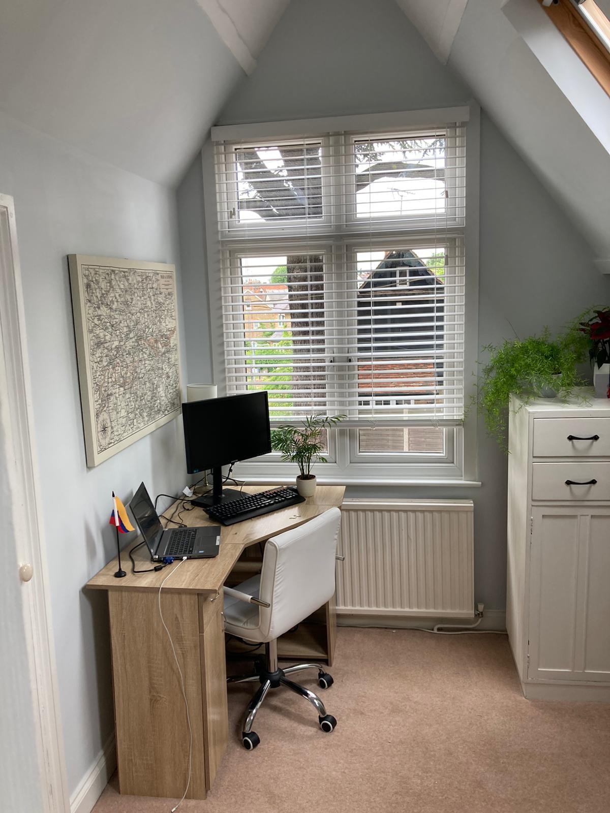 White Venetian blinds in a loft home office — Sustainable Shutters & Blinds
