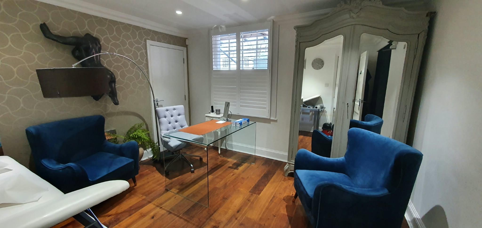 Shutters in a bay window — Sustainable Shutters & Blinds